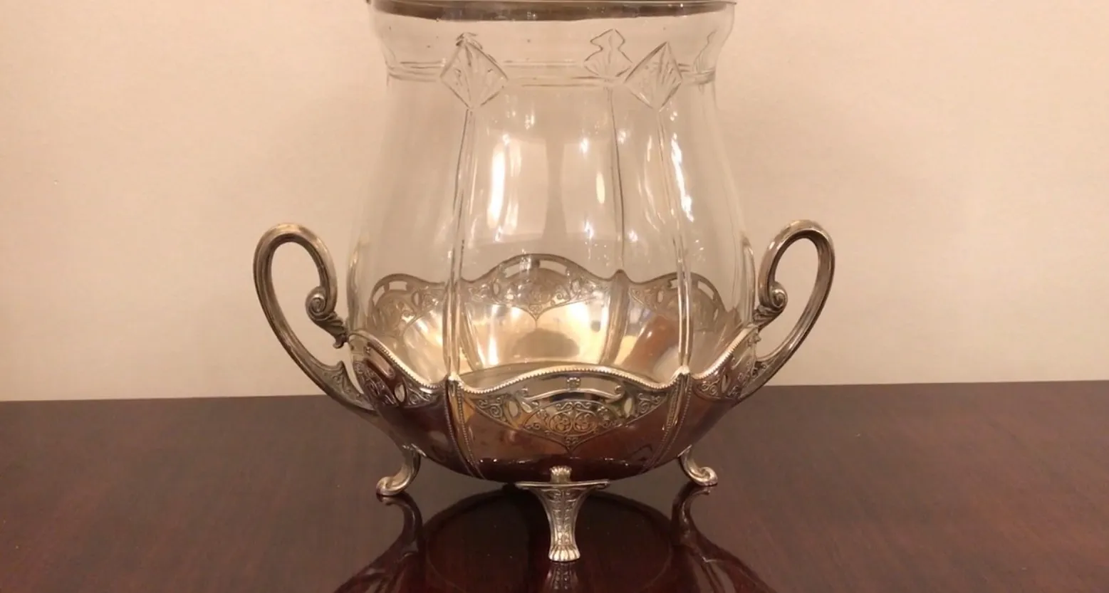 antique wmF punch bowl featuring elegant design and ornamental handles, perfect for special occasions.
