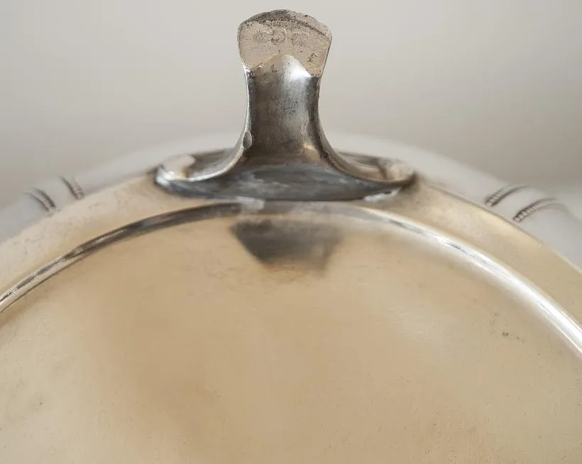 antique wmF punch bowl featuring elegant design and ornamental handles, perfect for special occasions.