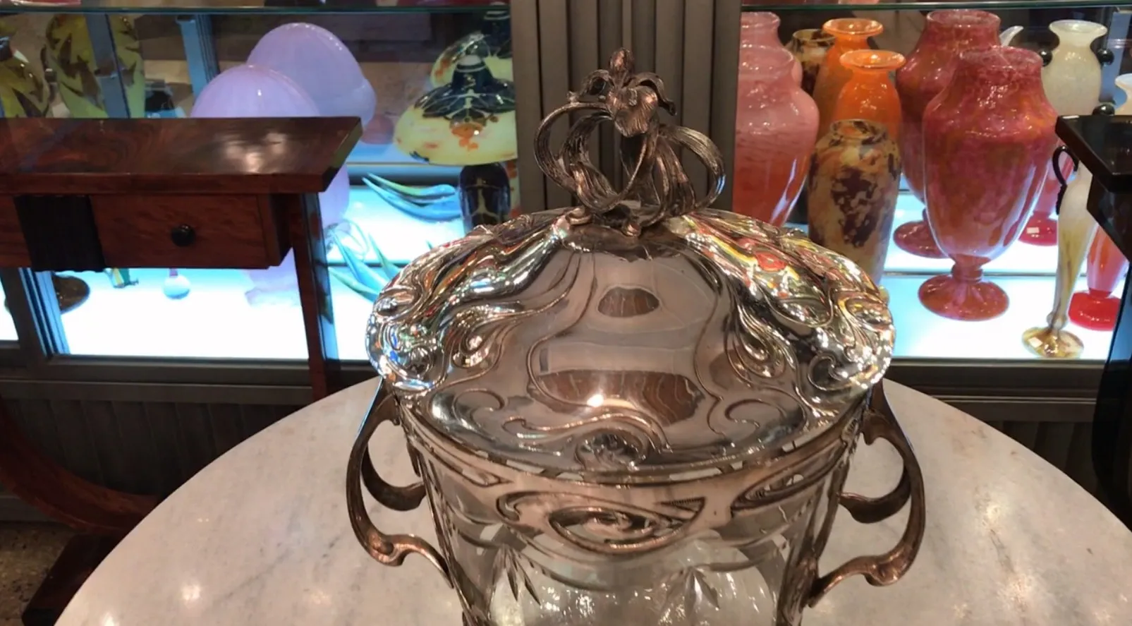 antique wmF punch bowl with detailed shiny metal lid