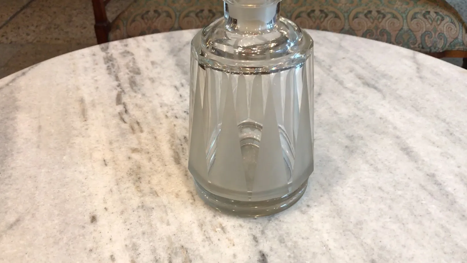 antique stylish bottle on marble table