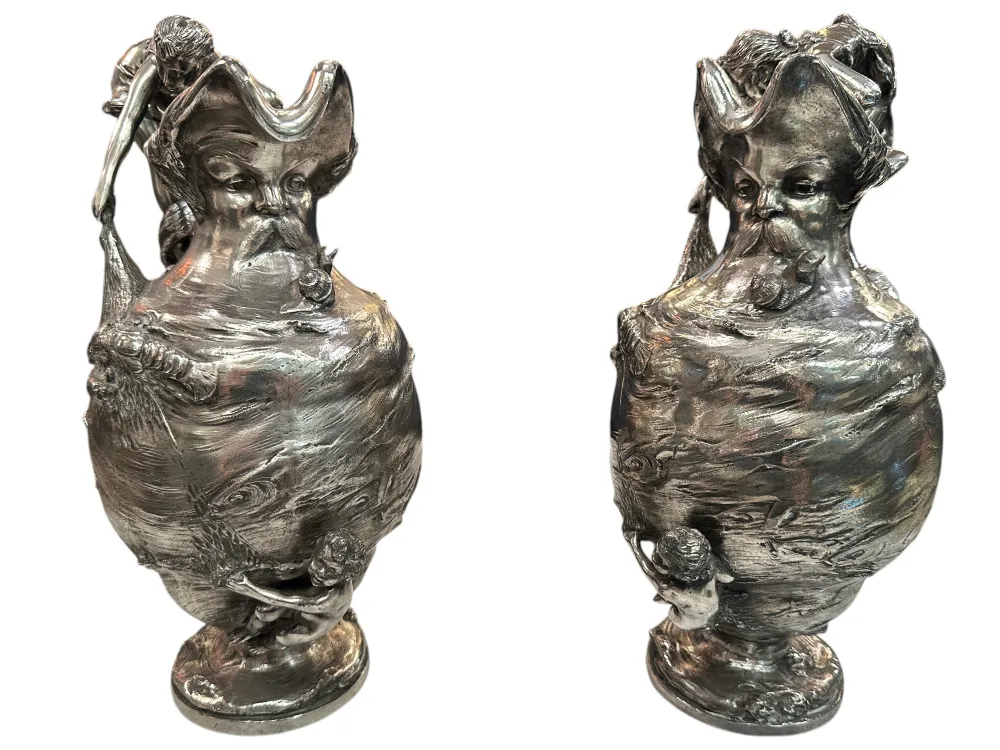 Antique decorative jars with detailed figures