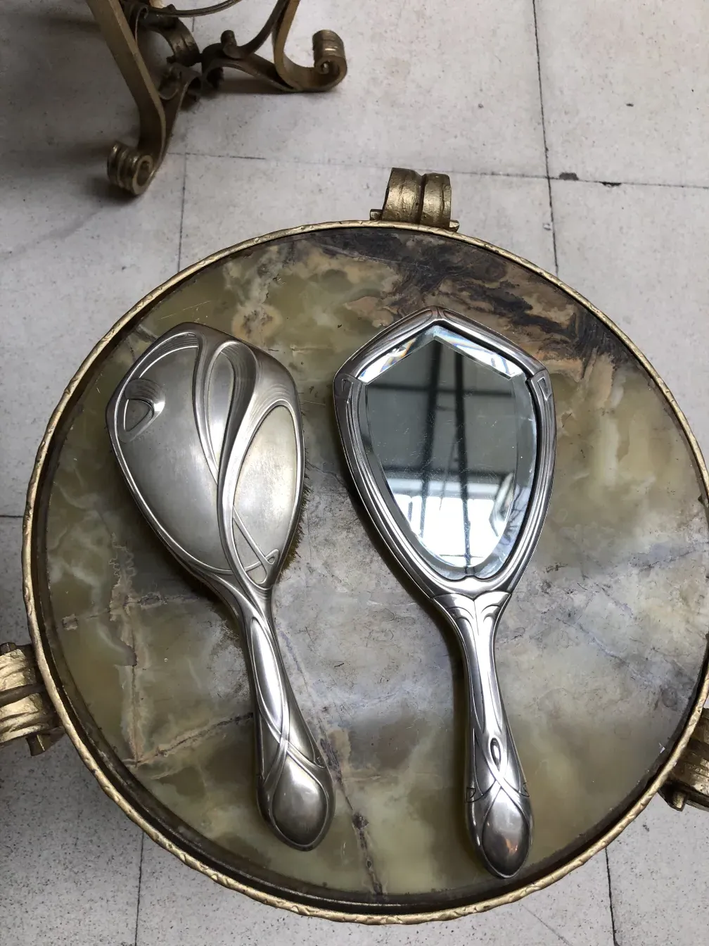 Antique hand mirror with an elegant design