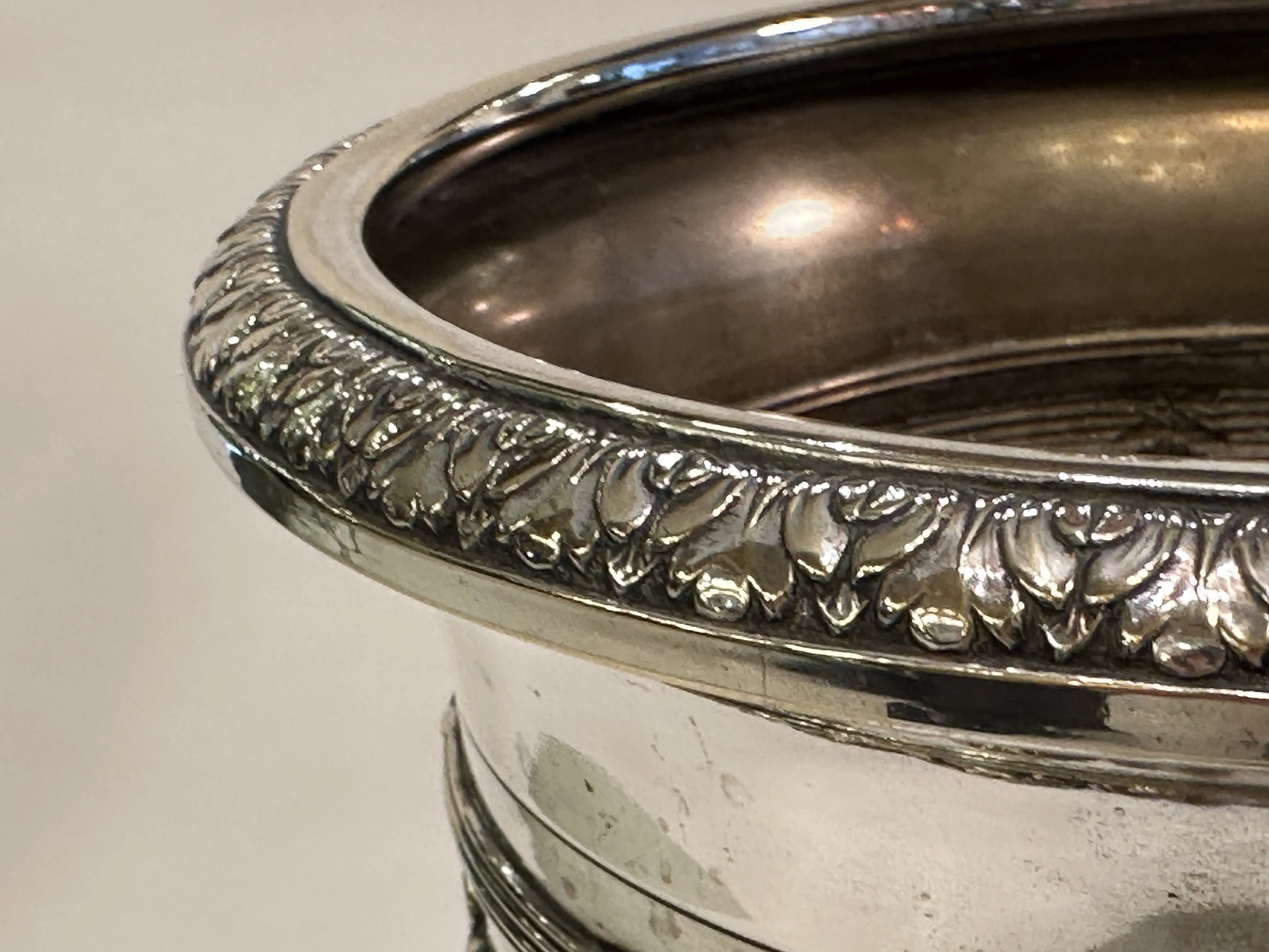 detailed view of 2 antique champagne coolers wmf with embellishments