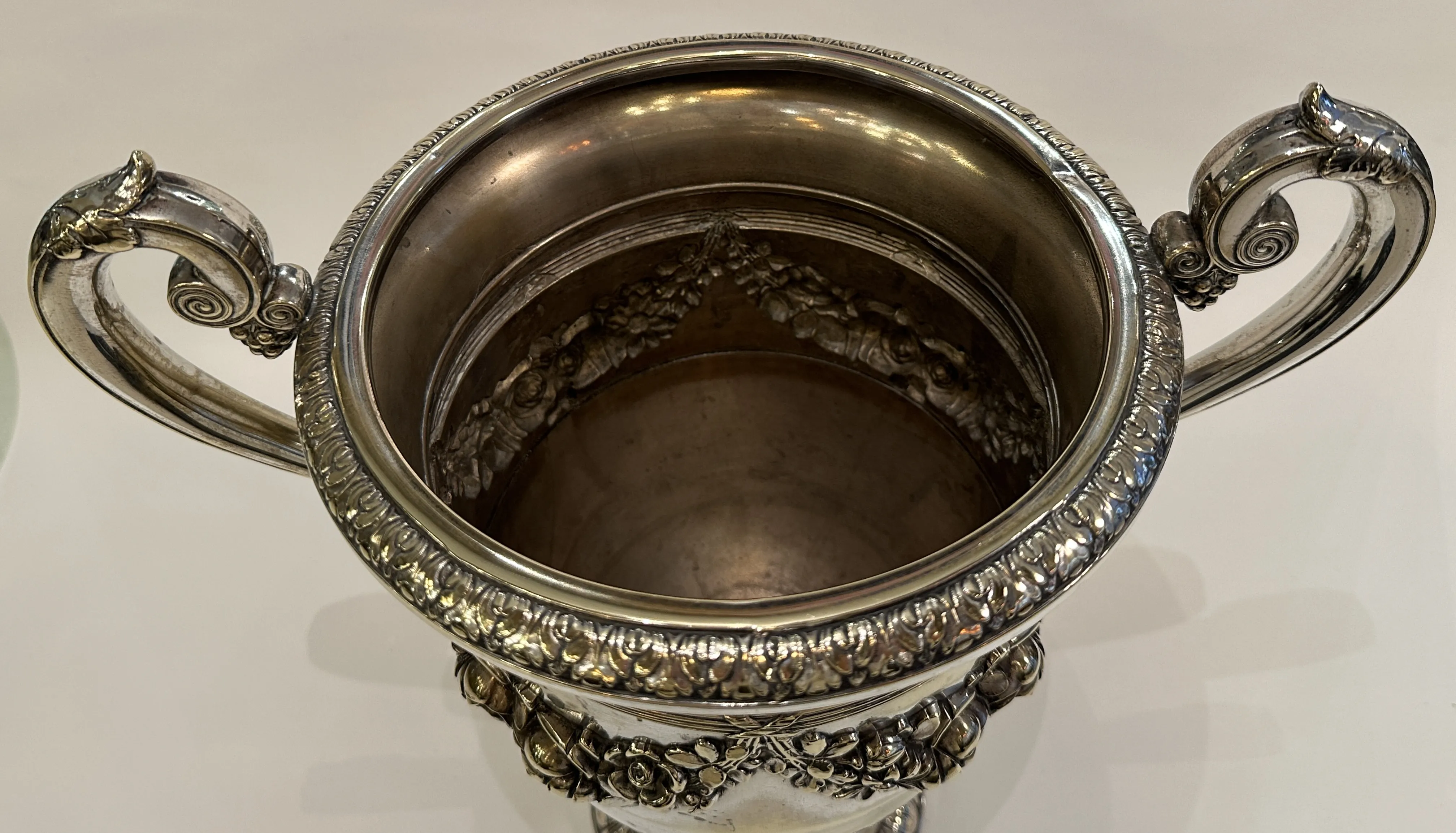 Antique wmf champagne coolers with floral decorations, wide bowl.