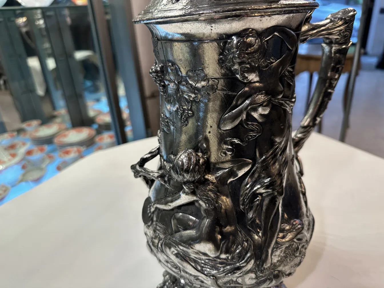 antique hot chocolate jug with decorative figures