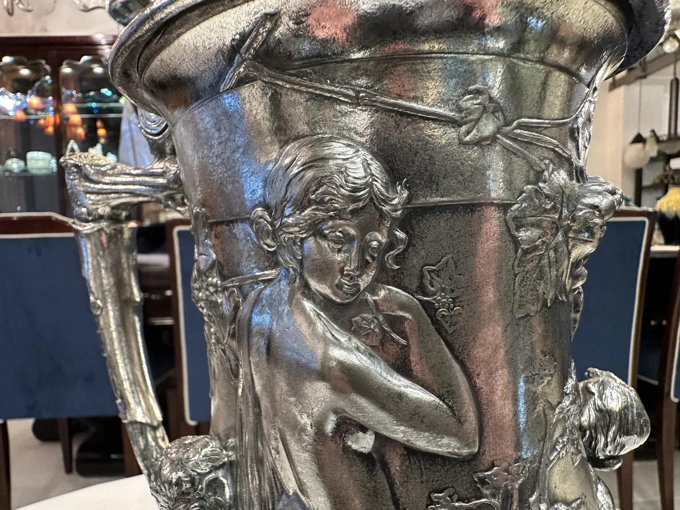antique hot chocolate jug with decorative figures