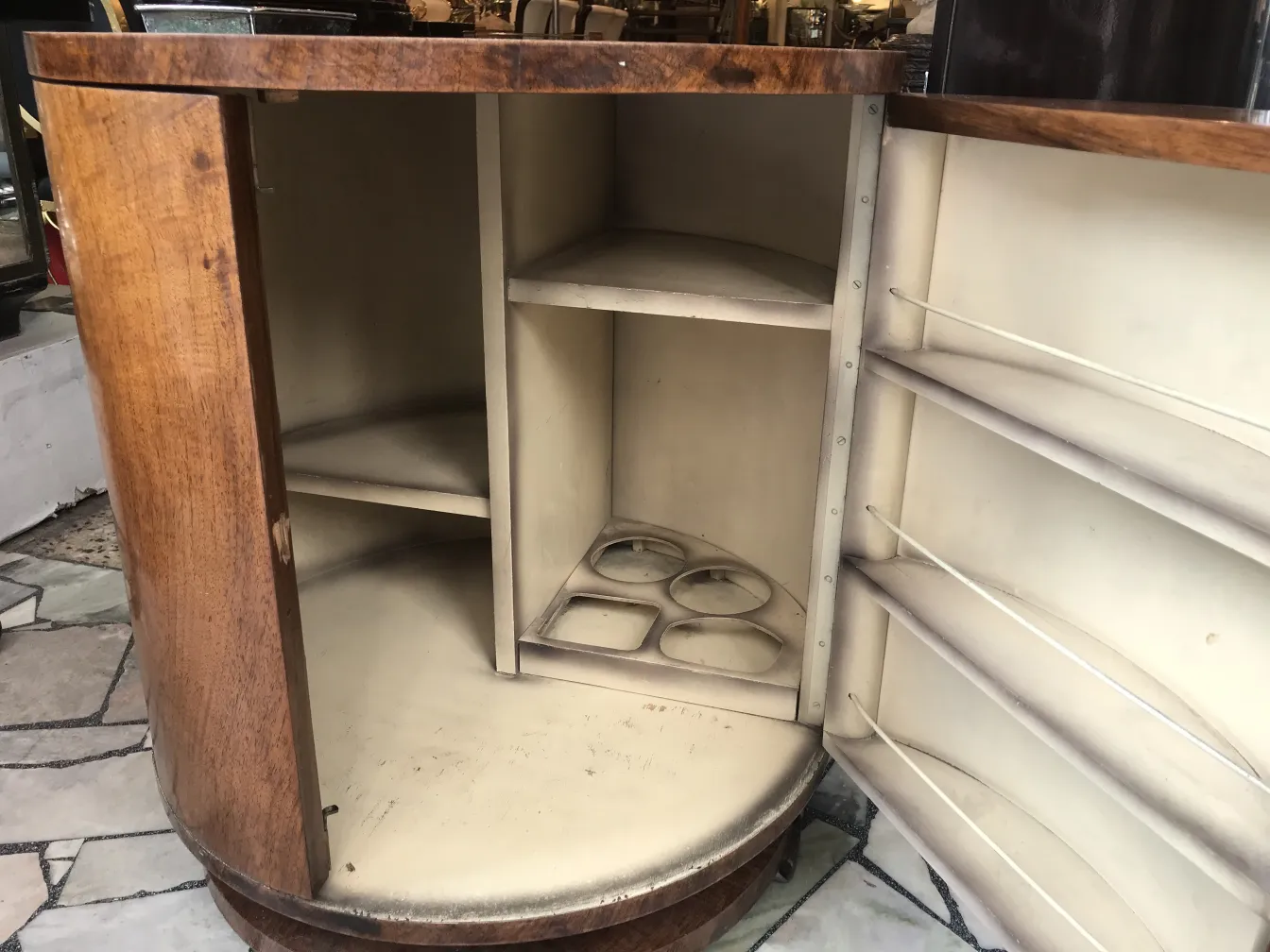Interior of an antique bar with shelves and storage space