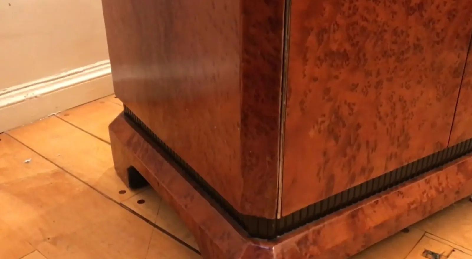 Antique wooden bar cabinet, stylish and functional, in a classic setting.