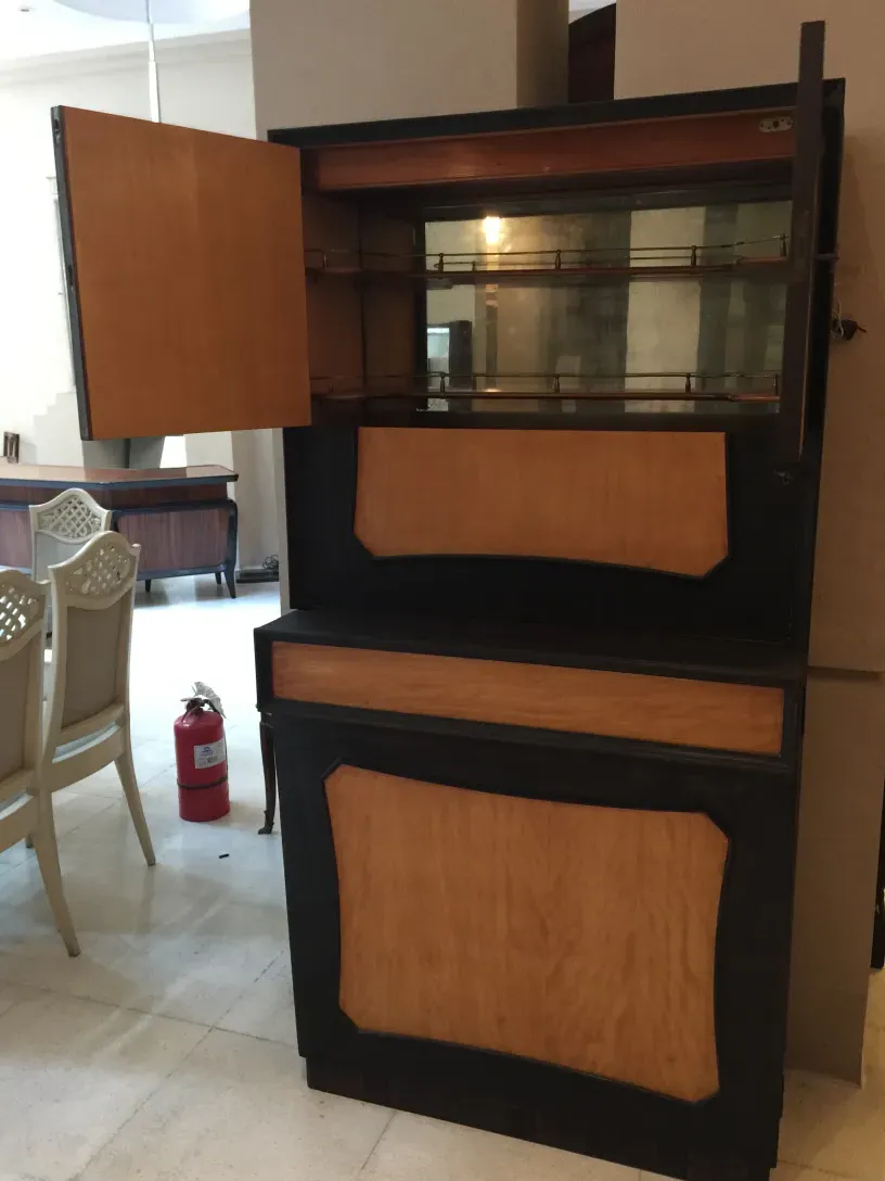 Antique bar furniture with a two-tone wood design.