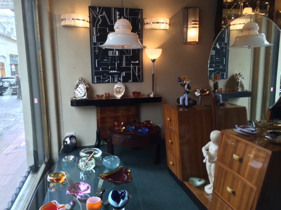 Antique pair of sconces with warm light, decorative in a cozy setting, featuring elegant details, orrefors.