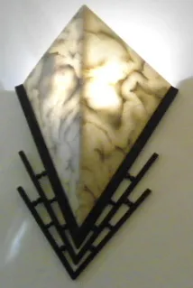 Antique pair of sconces shaped like a diamond, soft light