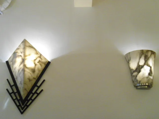 applique antiche a forma di diamante e cono