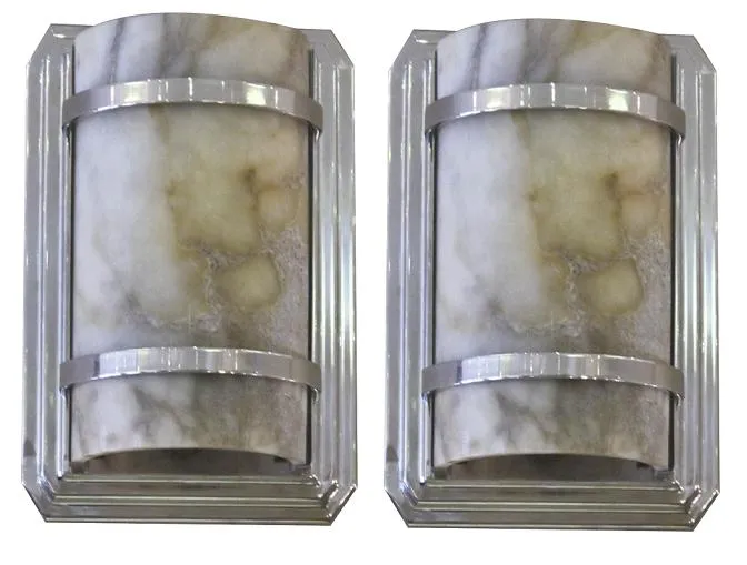 Antiguos apliques de pared en estilo clásico, decorativos, con detalles en metal, ideal para ambientes elegantes.