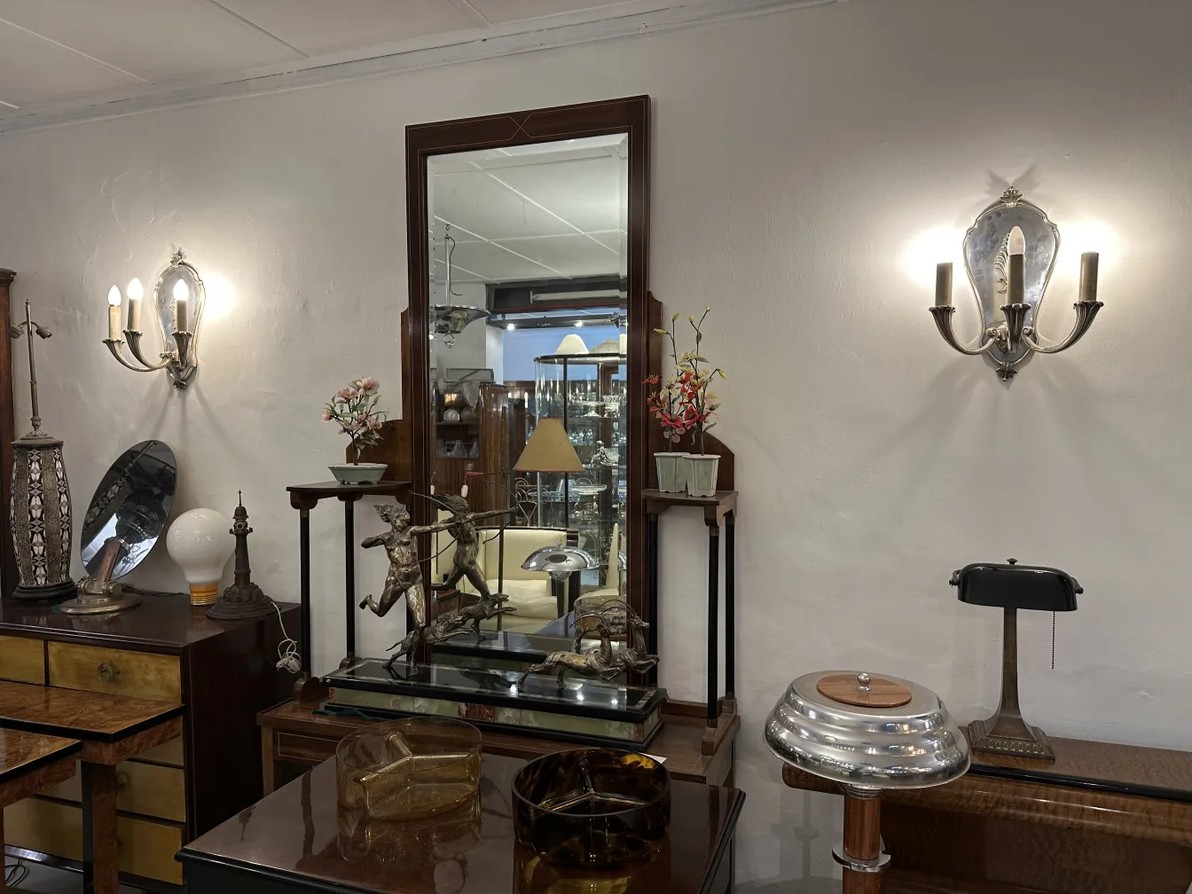 Antique pair of sconces in a stylish setting.