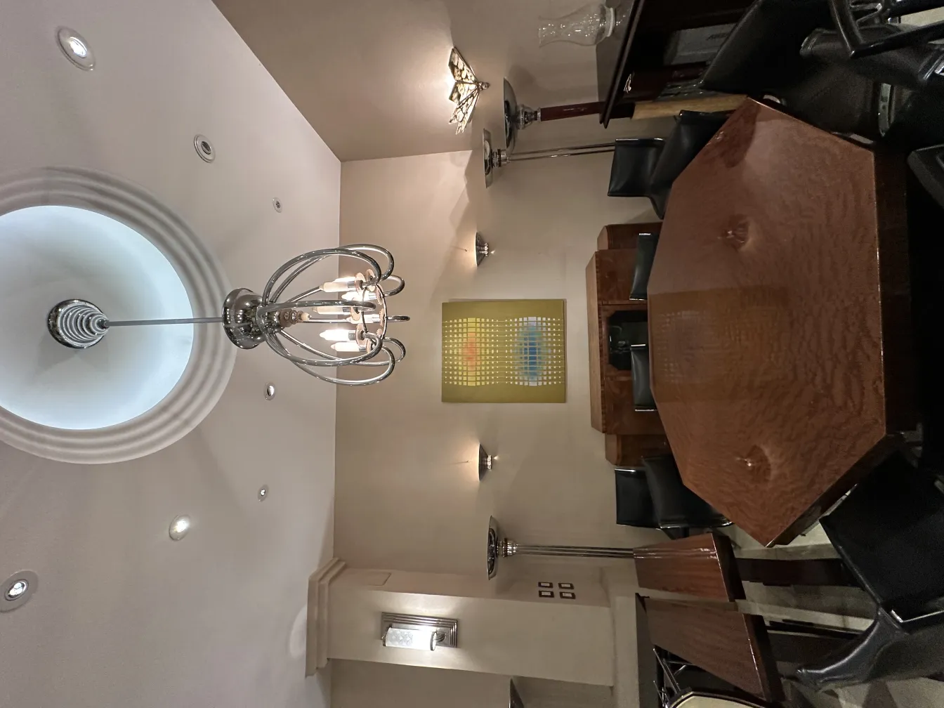 view of a room featuring an antique pair of sconces on the wall