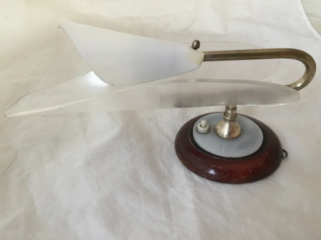 antique sconce with wooden base and unique lamp design