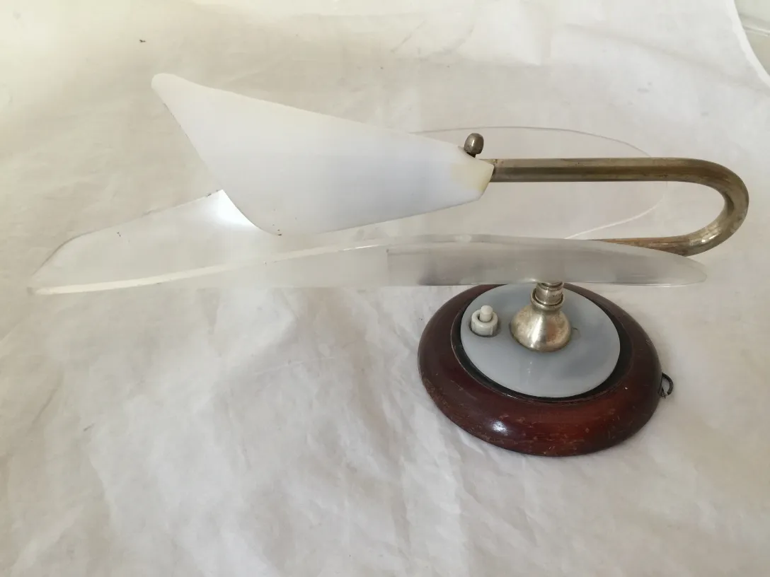 Antique sconces with wood and glass base, stylish and unique.