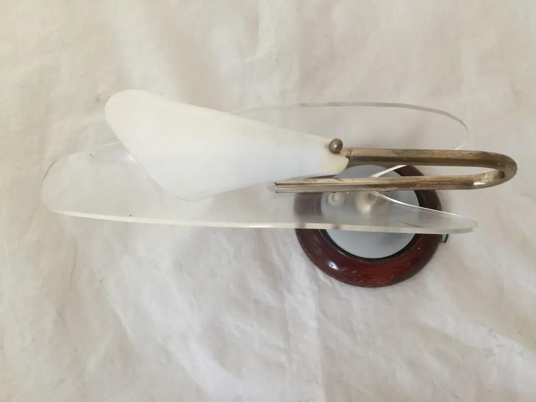 Antique wall sconces with soft light and simple design.