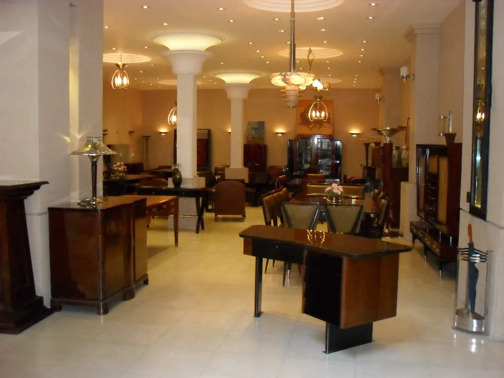 Antique pair of sconces in an elegant and cozy setting.