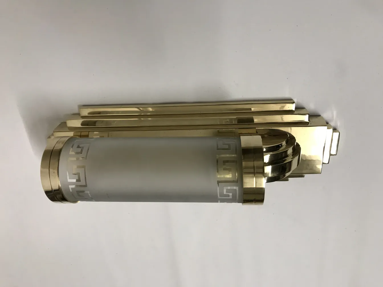 Pair of antique sconces with elegant gold design