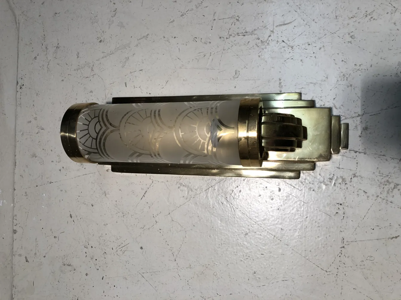 Antique sconces with elegant design and gold finish, perfect for decor.