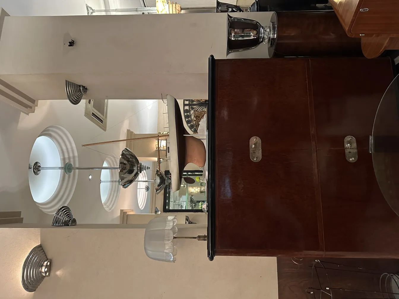 Antique pair of sconces in a cozy decorative setting