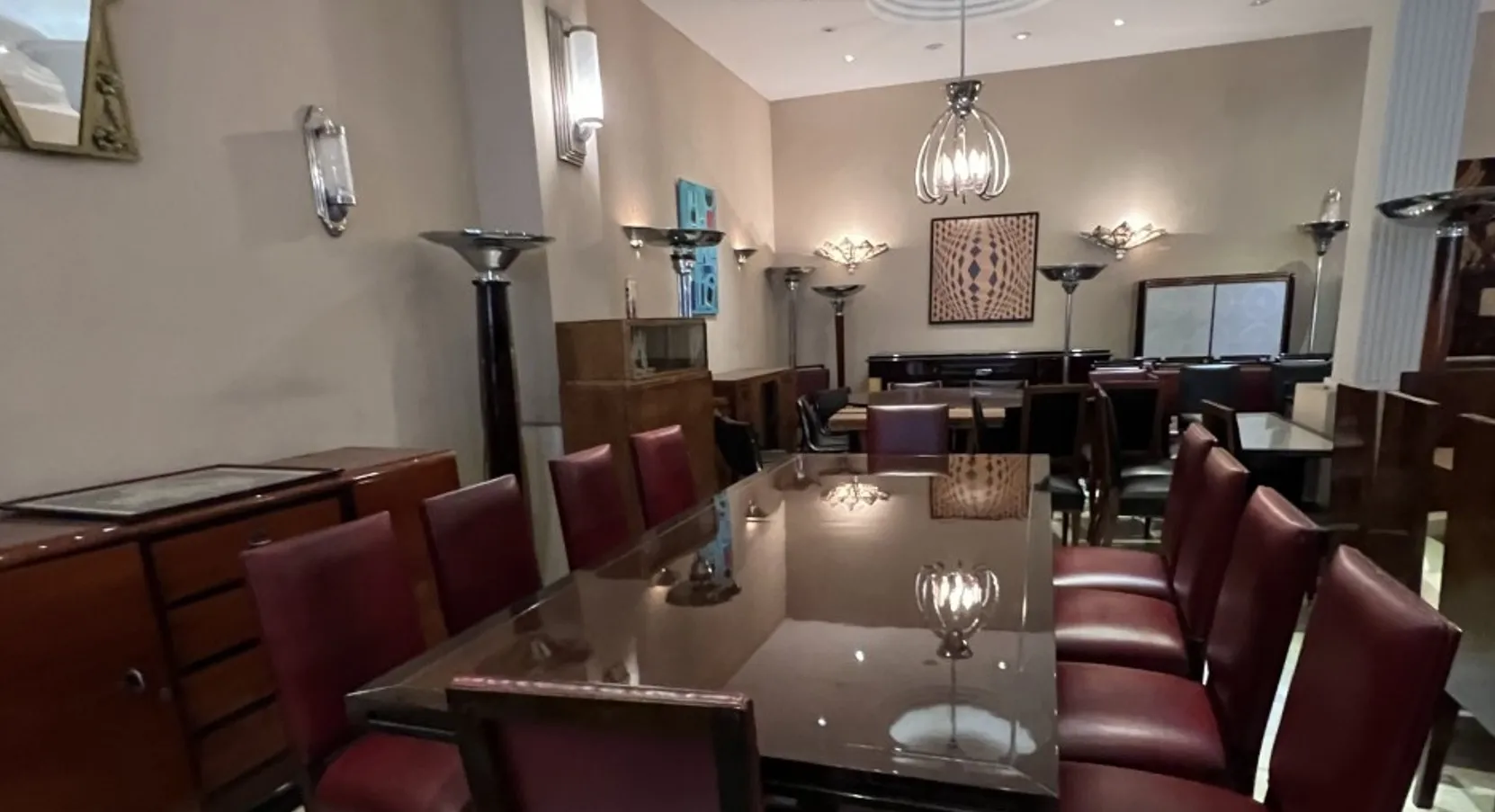 Pair of antique sconces in an elegant dining room