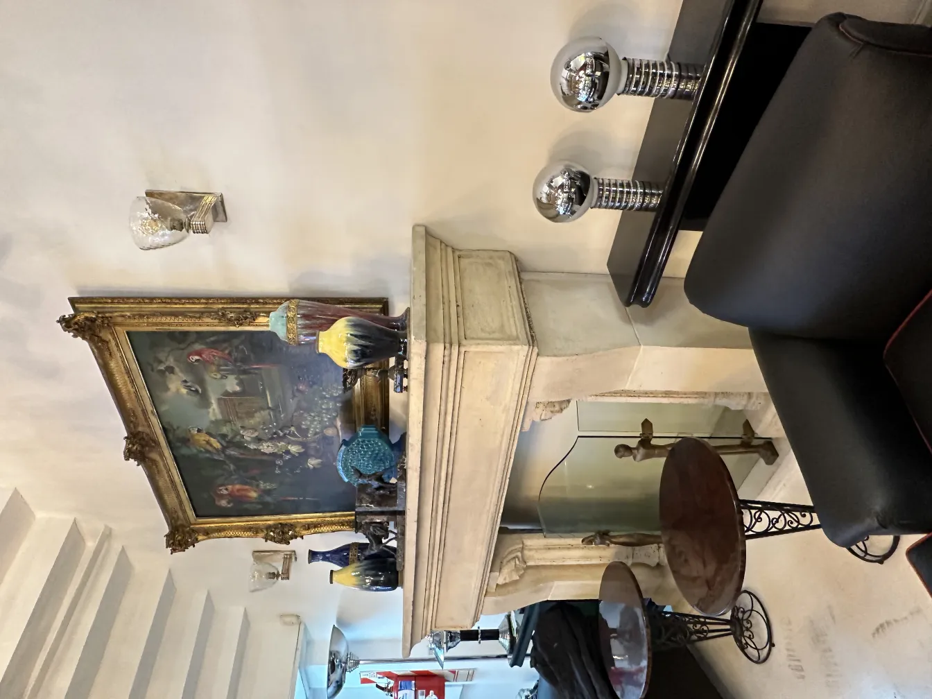 Pair of antique sconces with elegant design and lights