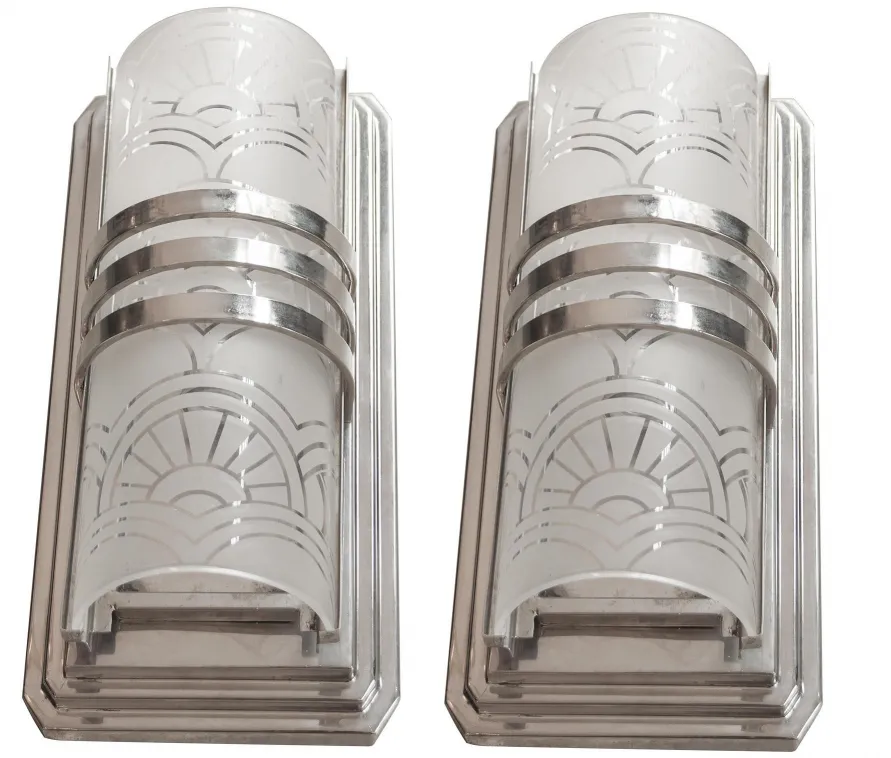 Antique pair of sconces with art nouveau design, elegant style with engraved front details.