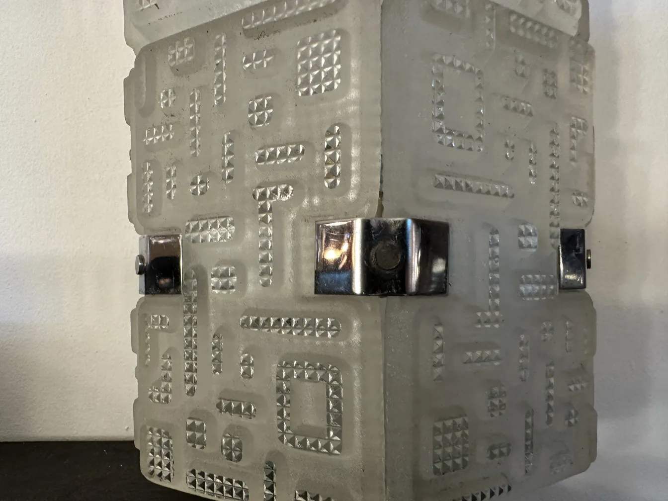 Antique pair of sconces featuring unique design and relief texture, perfect for enhancing decor.