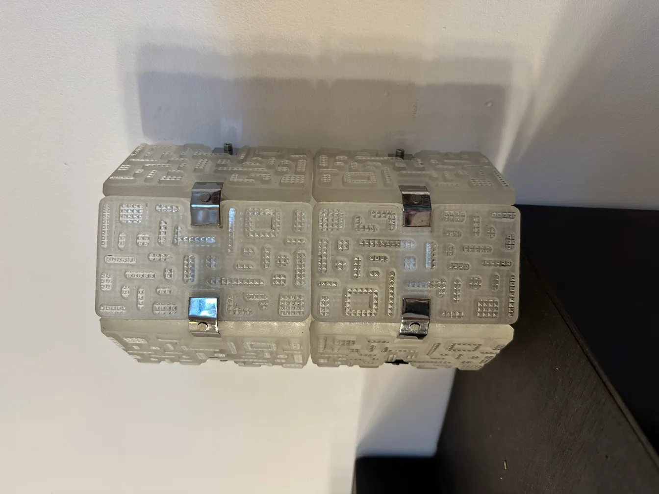 Antique sconces with unique design, perfect for decor.