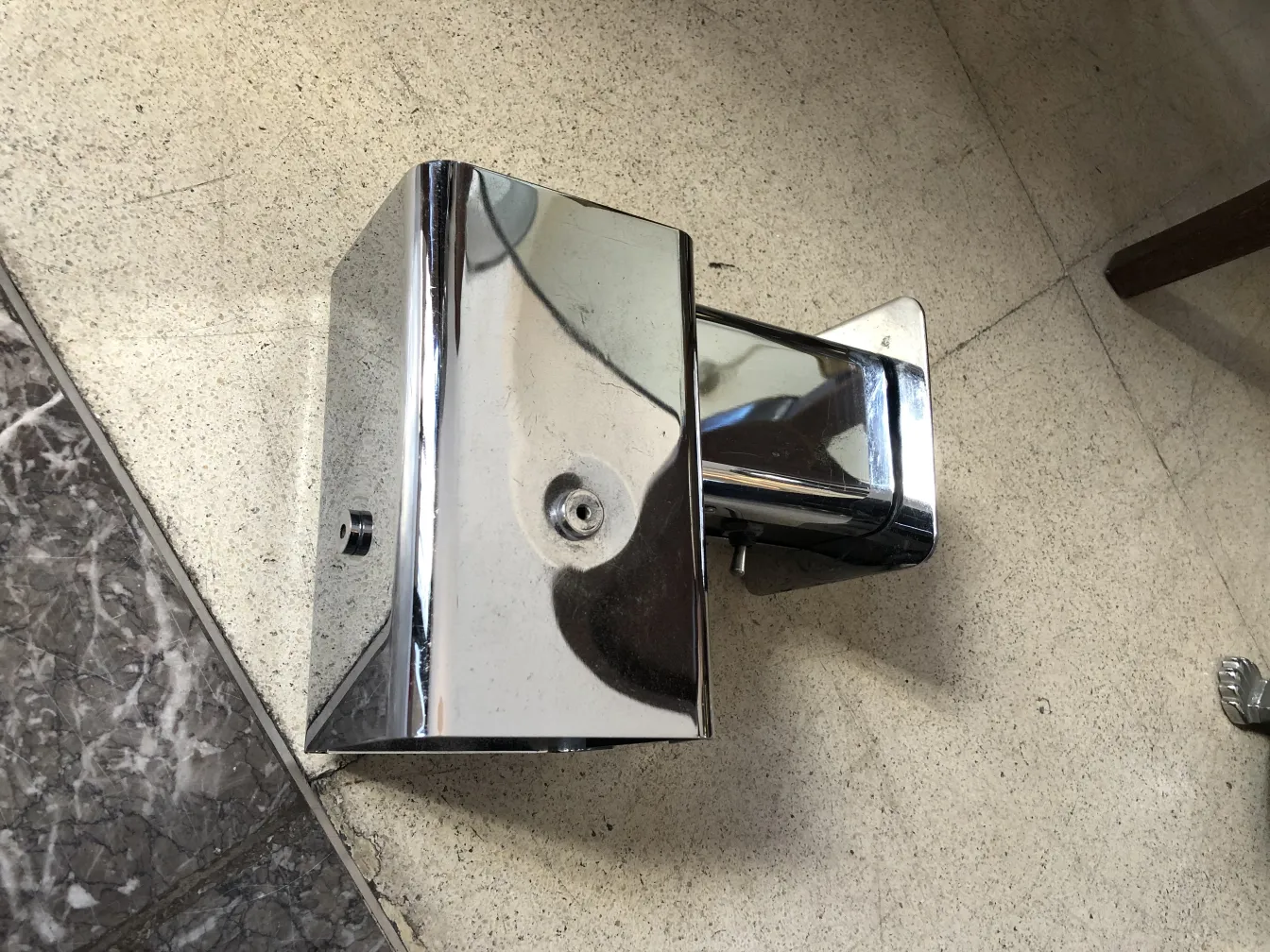 Pair of antique chromed sconces, stylish design and finish.