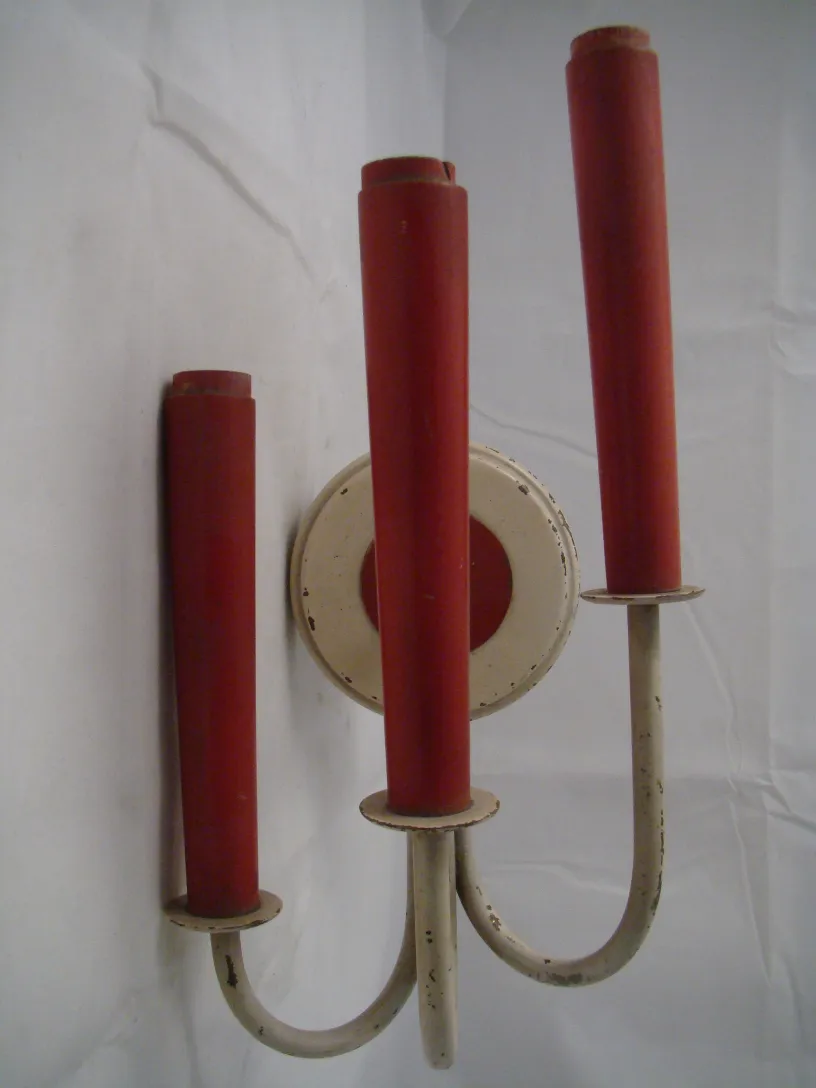 Antique pair of sconces featuring red details and light base