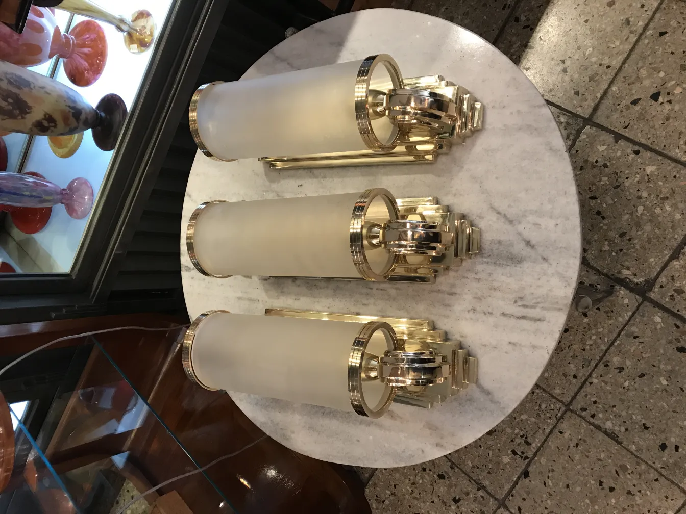 Pair of antique sconces with classic design in an elegant setting