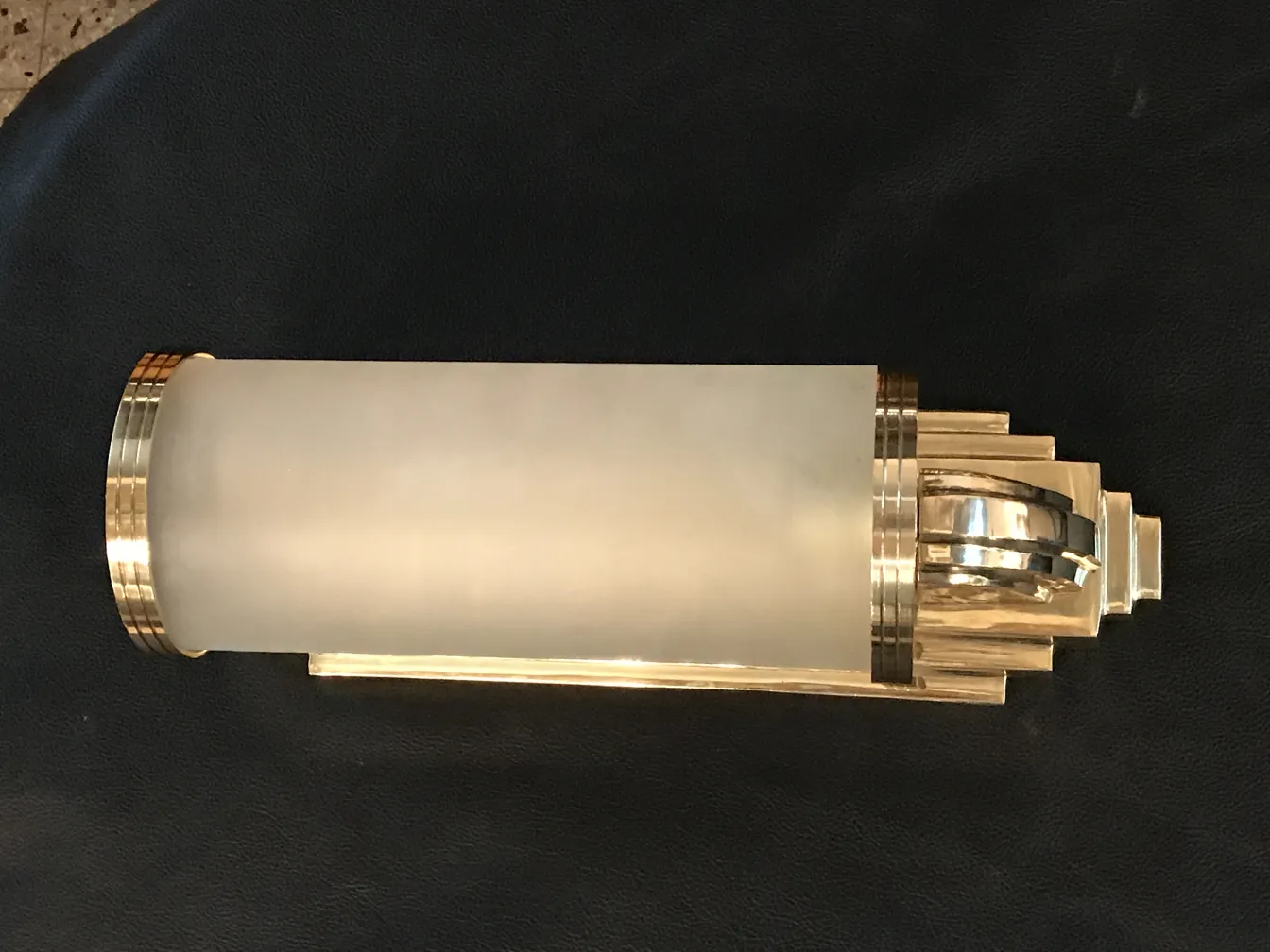 Antique wall sconces, elegant with golden details.