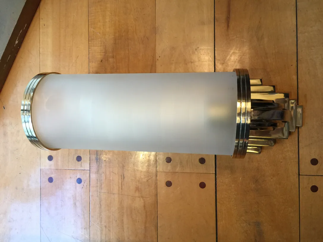 Antique sconces with elegant design and golden details.