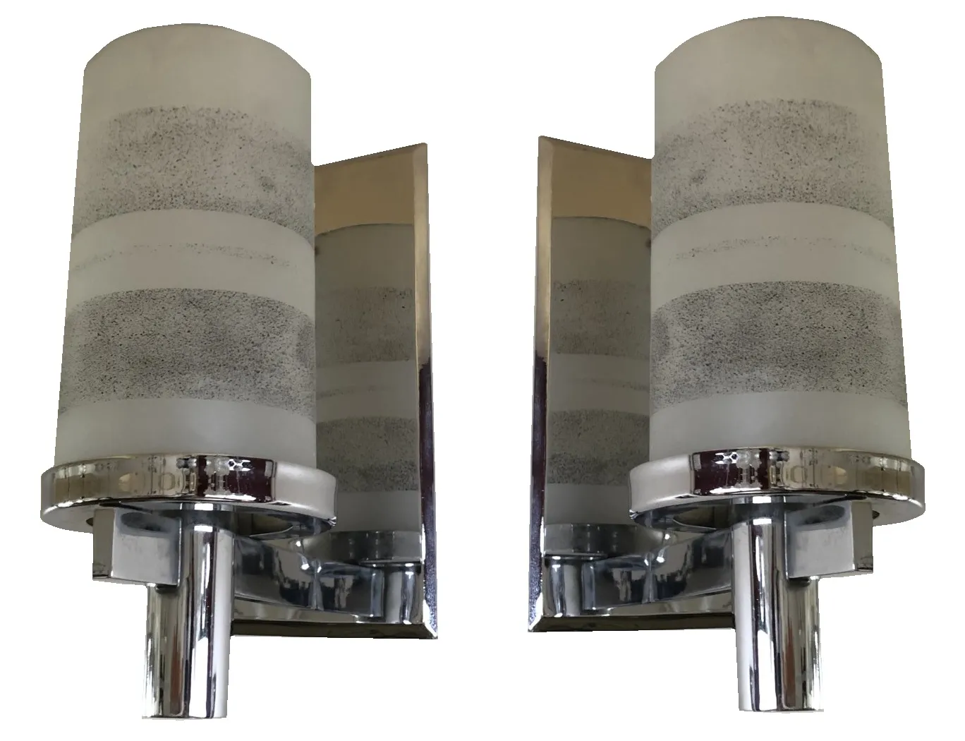 Antique wall sconces with frosted glass in a cozy setting