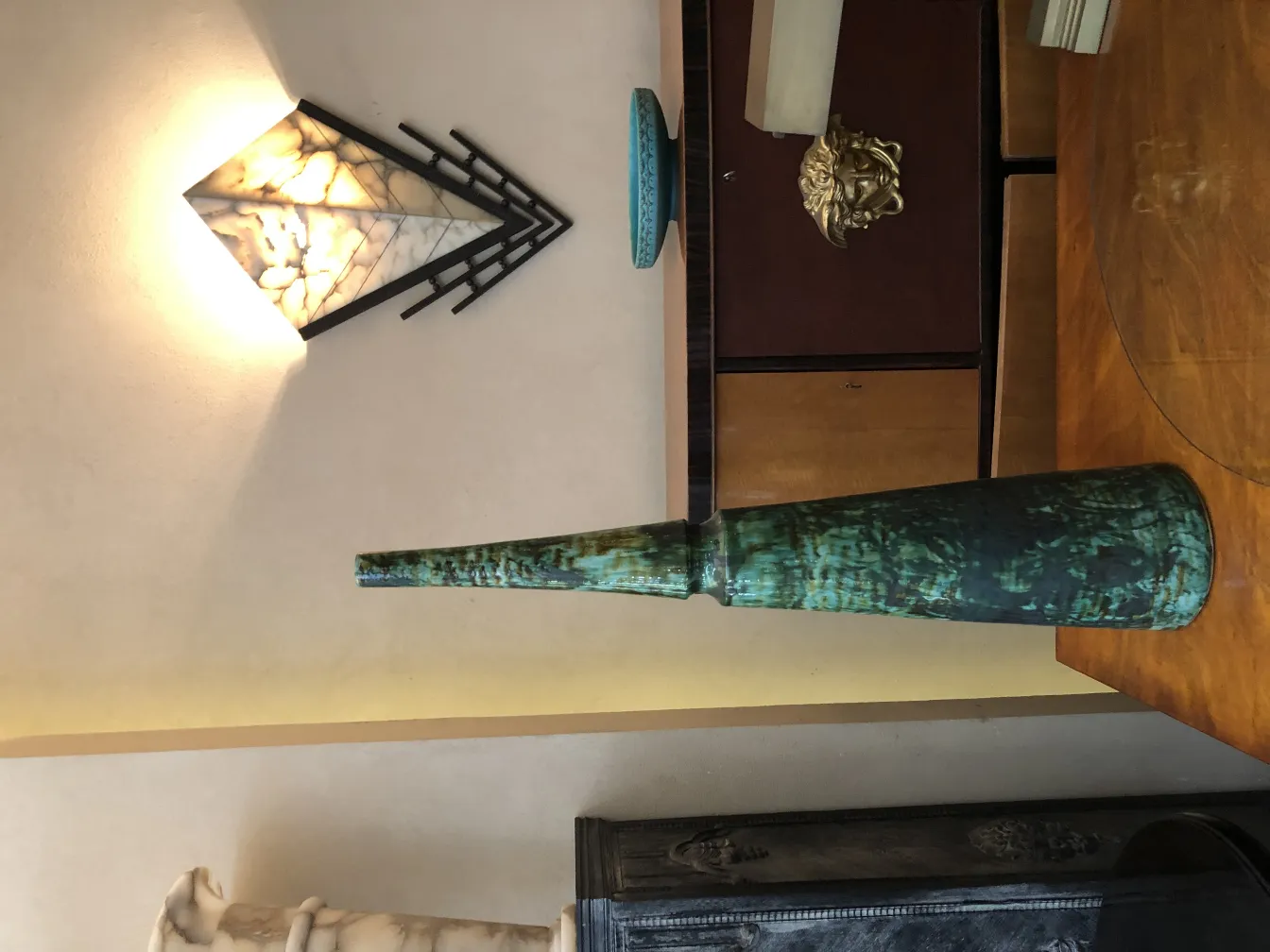 Antique green ceramic vase with unique style and decoration.