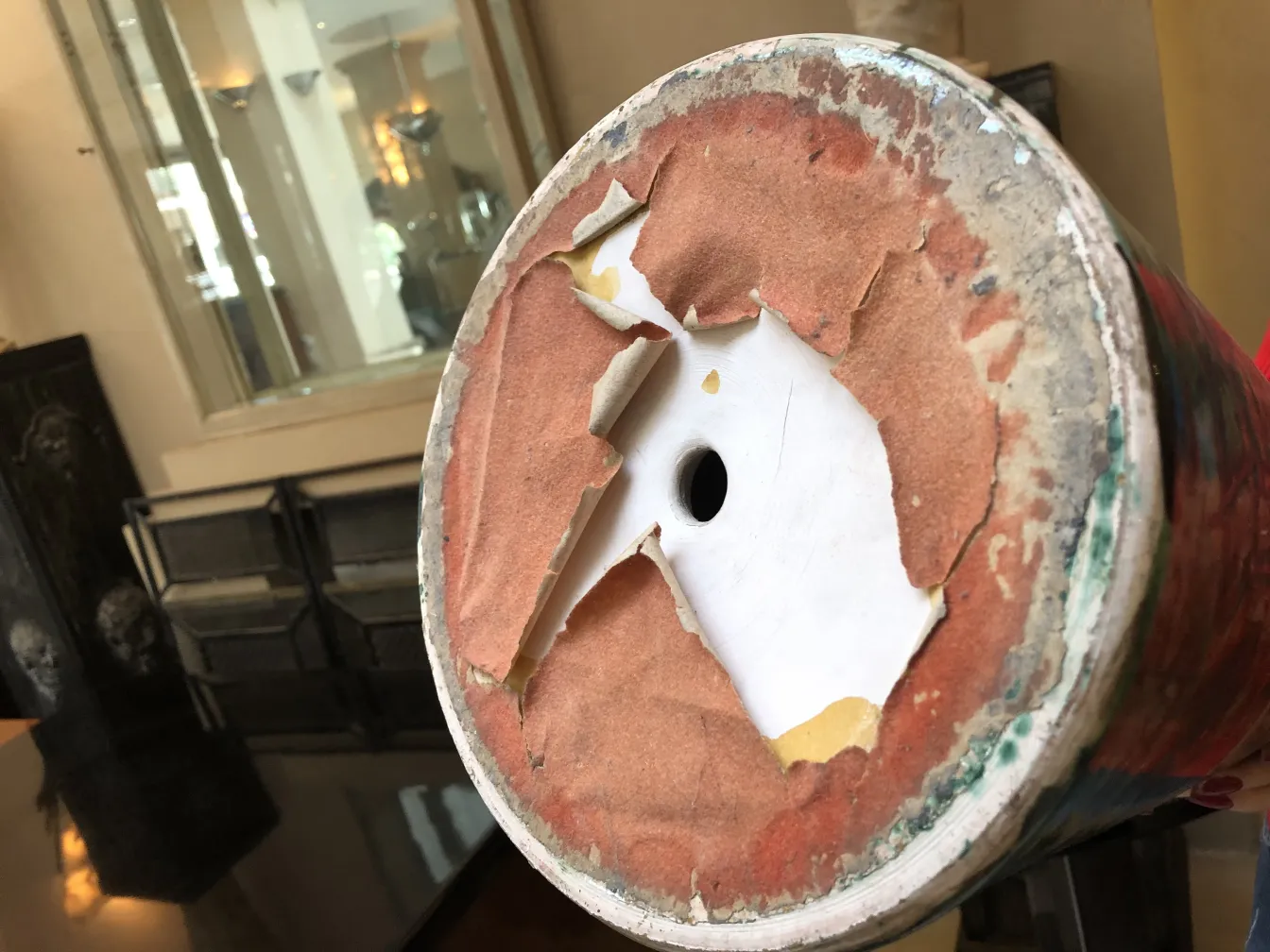 Base of an antique ceramic with worn details