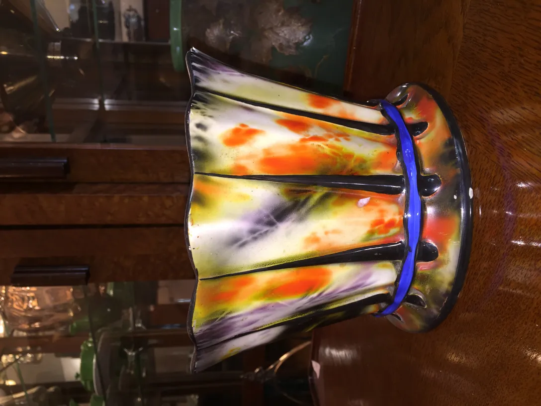 Antique colorful ceramic floral shaped with blue details