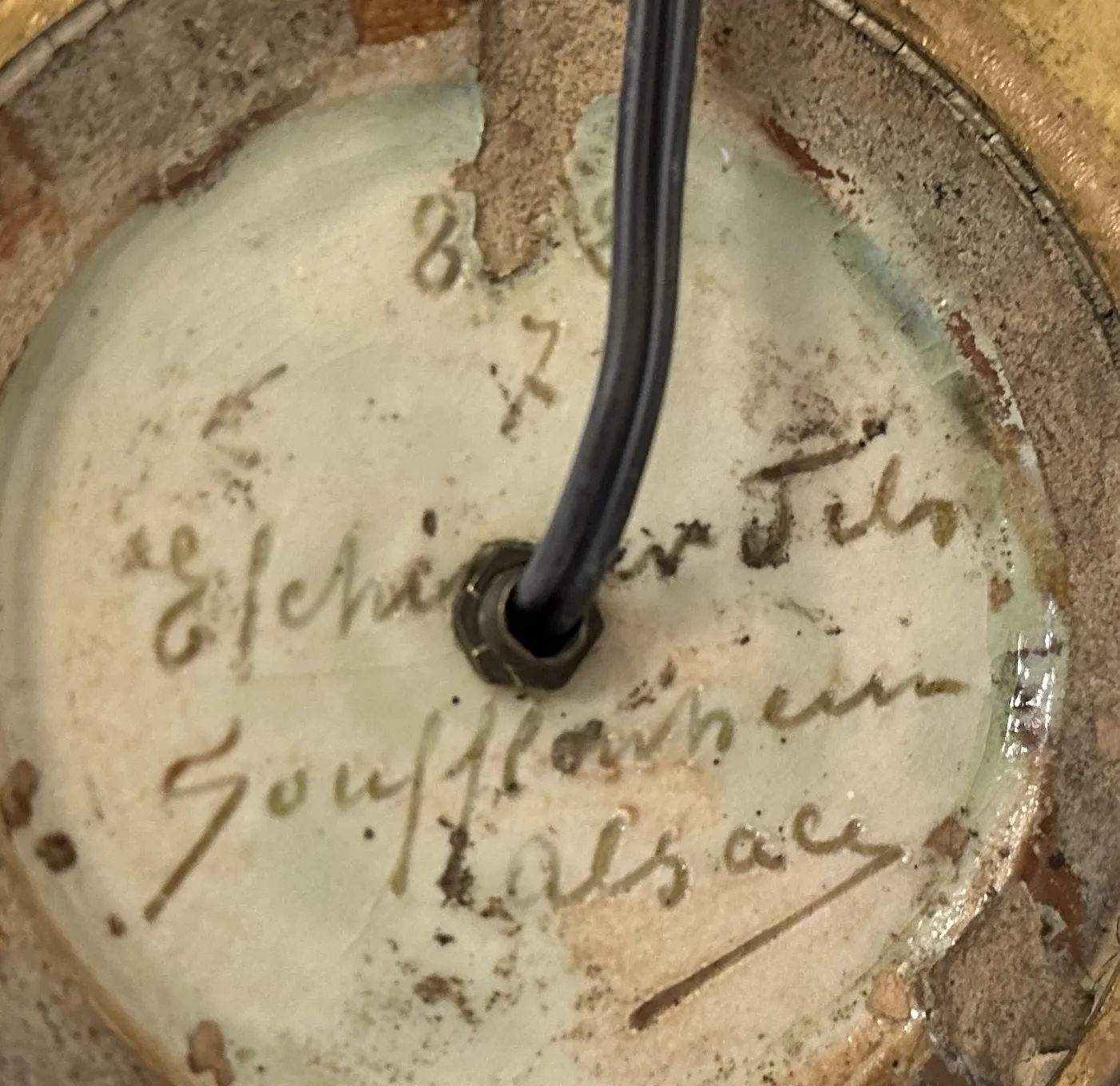 sello antiguo con inscripciones elchinger fils soufflenheim alsace en fondo claro