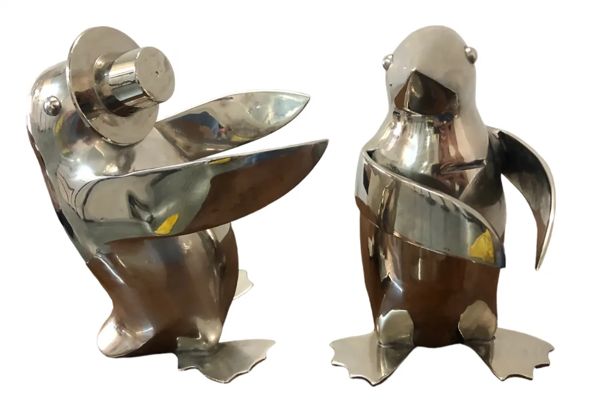 deux vieux pingouins dans un cadre décoratif