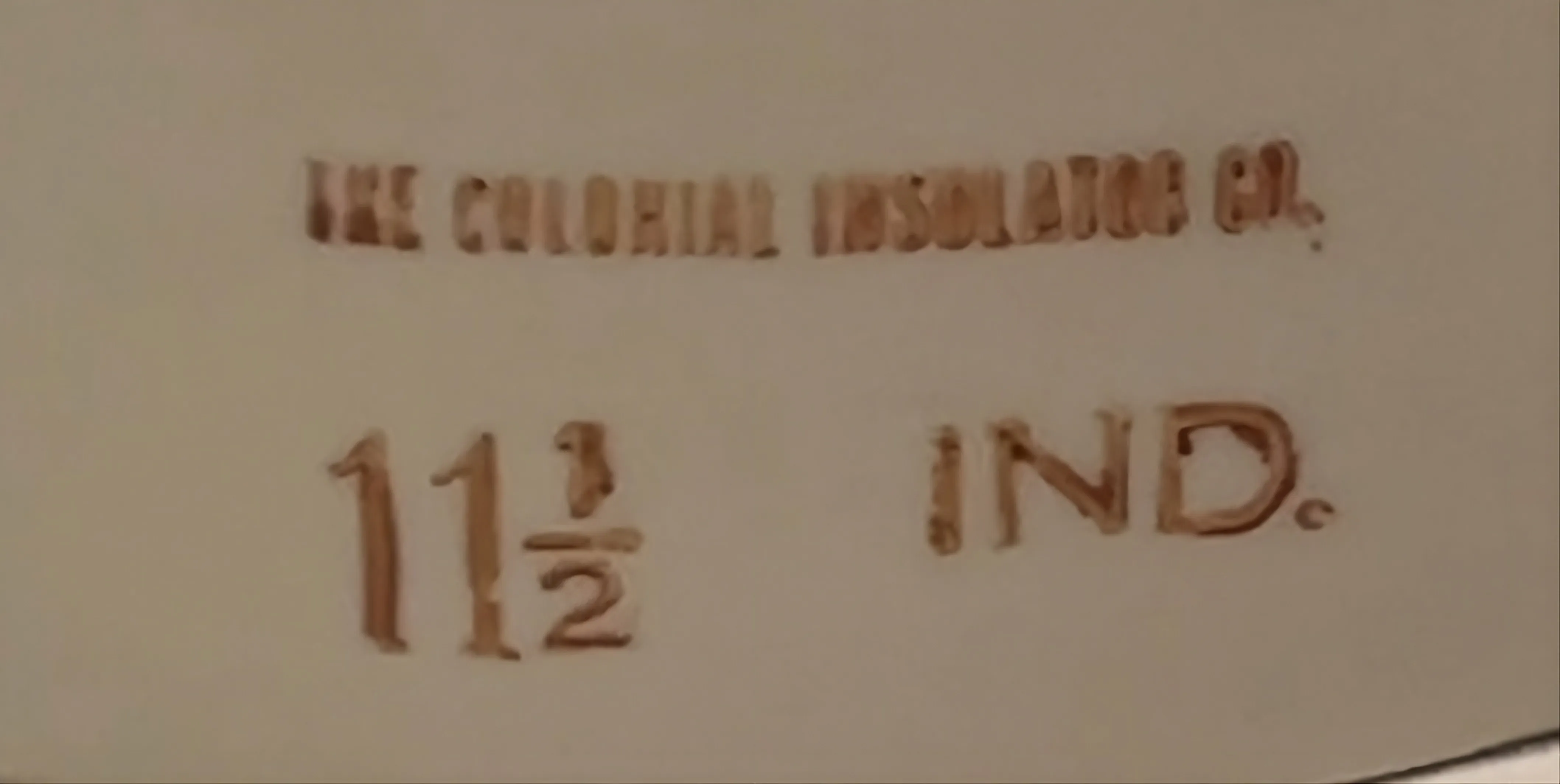 ختم قديم مع نقوش واضحة لشركة The Colonial Insulator Co.